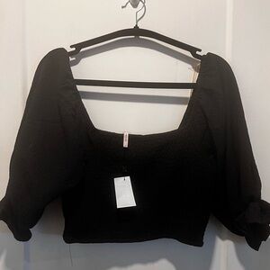 NWT BCBG size L. N elastic stretch cropped shirt.